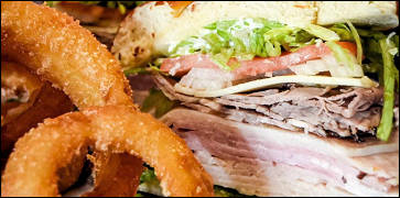 Cali Club Sandwich and Onion Rings